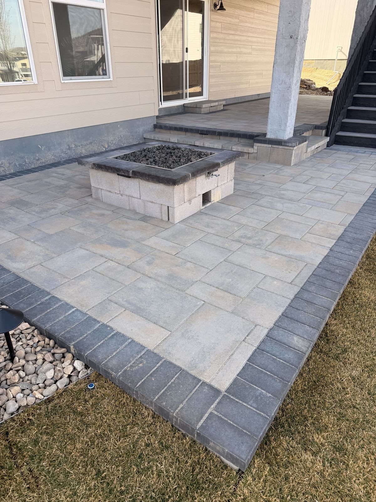Paver patio with built-in fire feature